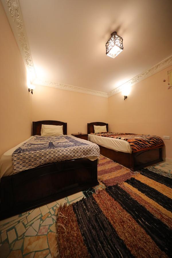 Pyramids Loft Guesthouse Cairo Quarto foto